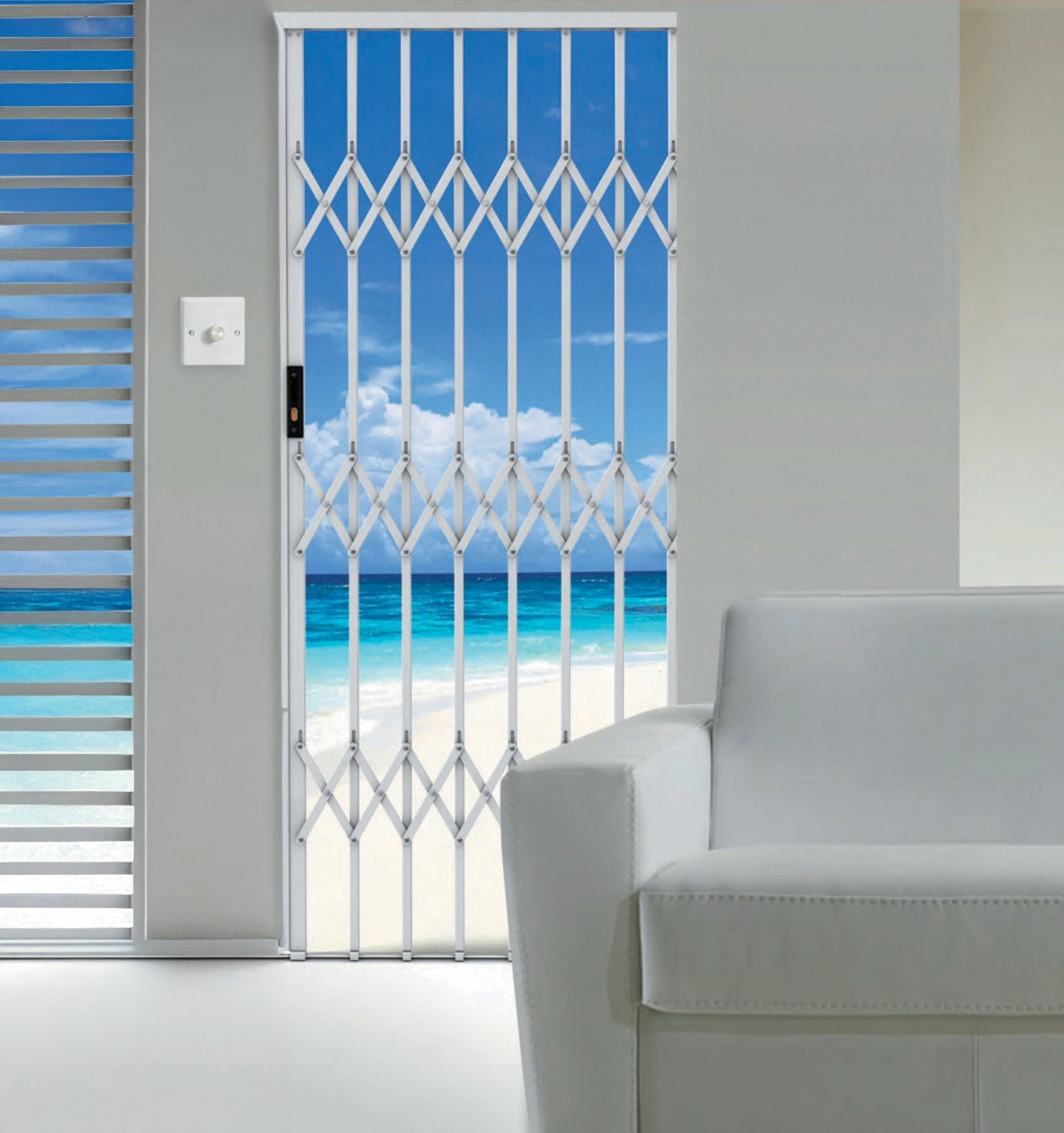 Xpanda white retractable security gate installed on a glass door – secure and stylish barrier solution by Doors Direct.