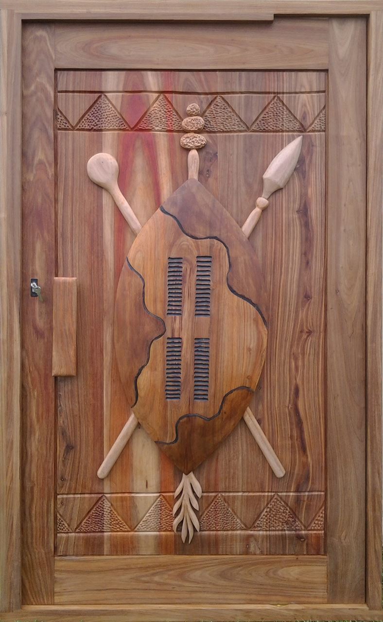 Shield Hand Carved Meranti Pivot
