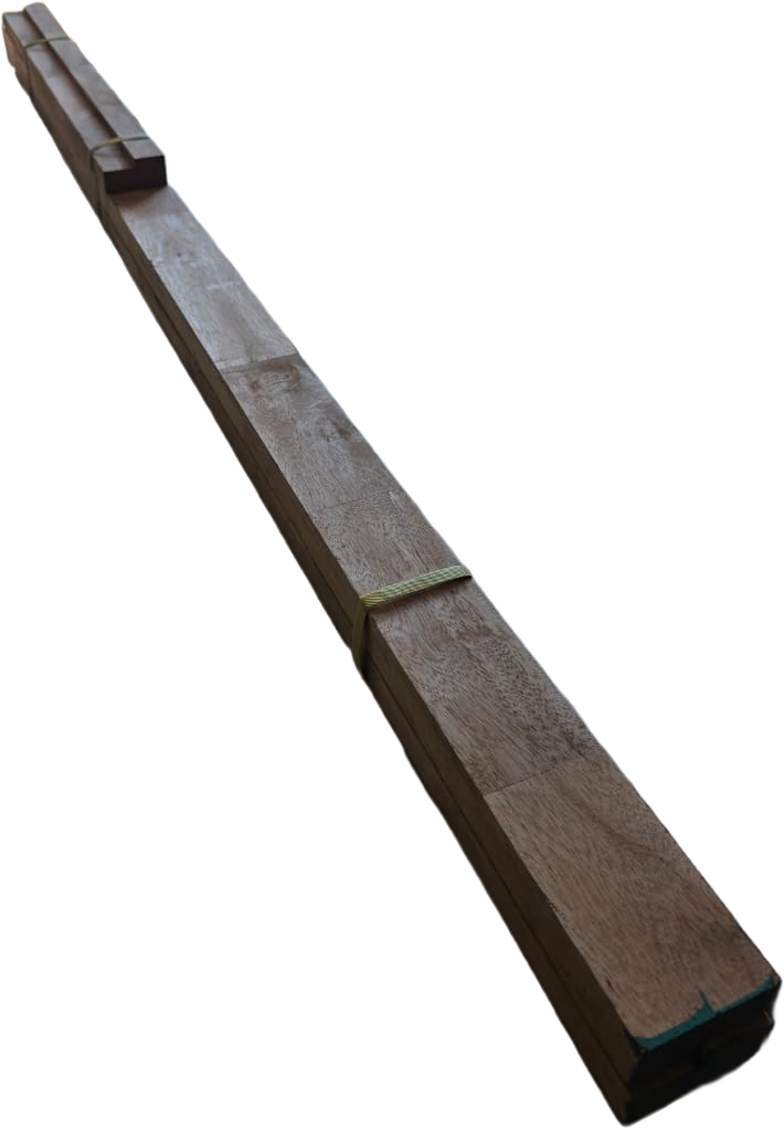 Long perspective view of a knock-down hardwood door frame kit bundled with yellow strapping for transport and assembly.