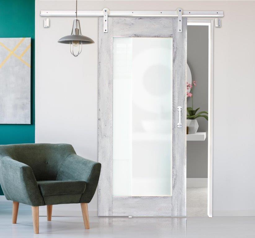 Lockeport frosted glass barn door with whitewashed wood frame and white top-mounted sliding track