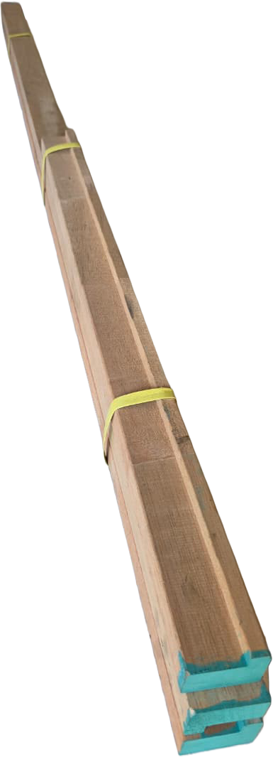 Long perspective of a knock-down 80mm hardwood door frame kit secured with yellow strapping for professional installation.