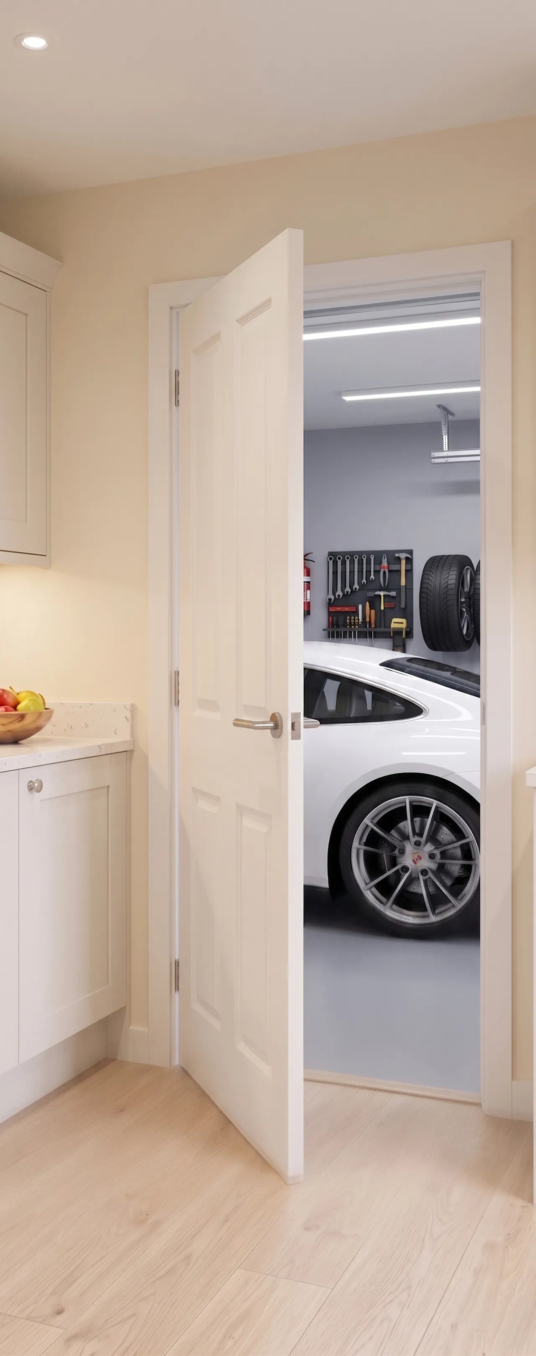 White car in a garage accessed through Deep moulded fire door from kitchen.