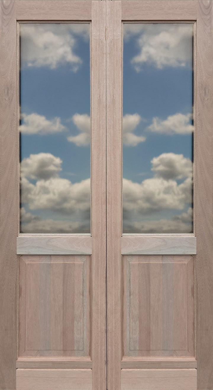 Wooden double doors with glass panels reflecting a blue sky and clouds