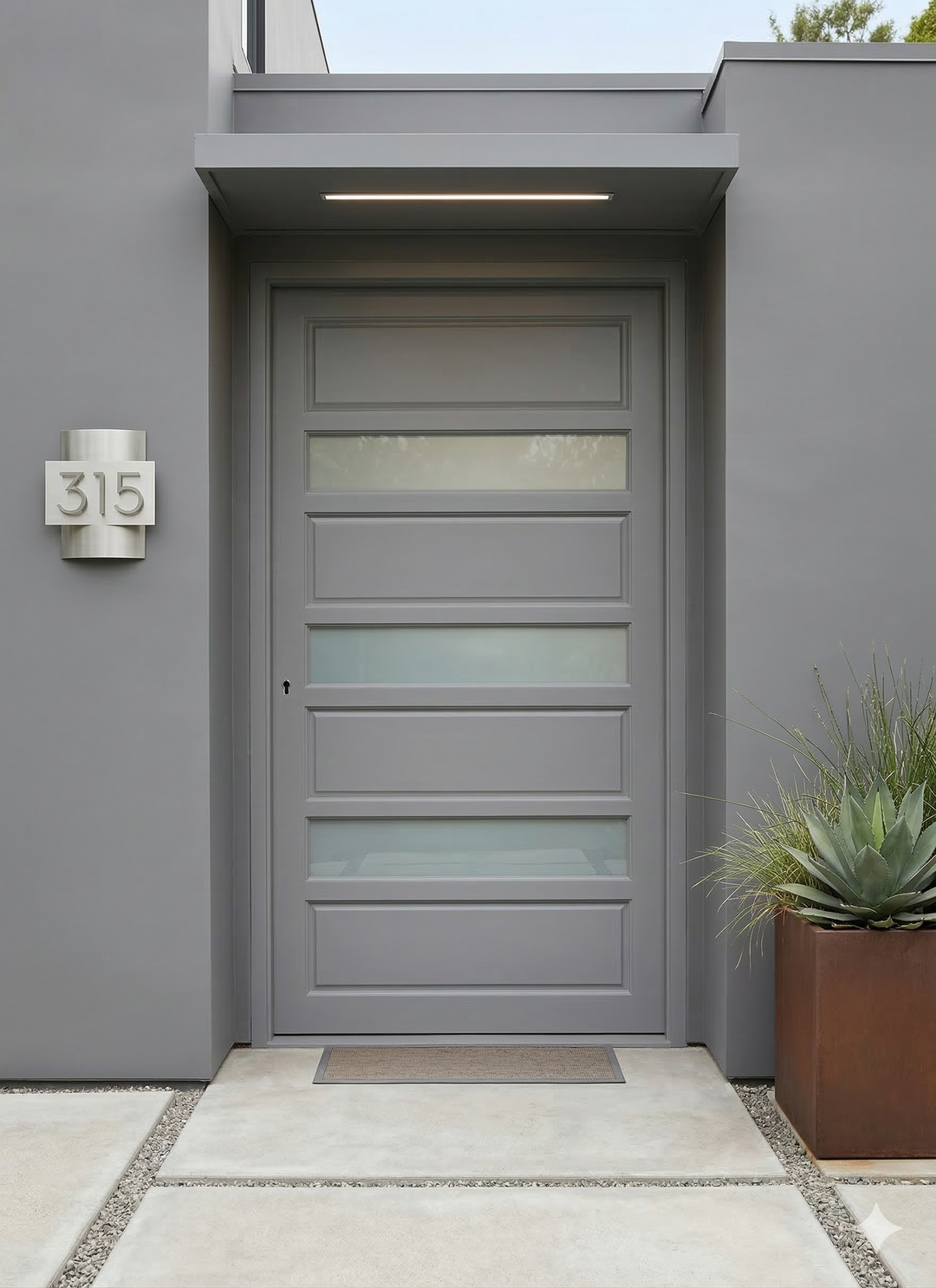 Modern gray front door with glass panels on a gray wall, featuring the number 315.