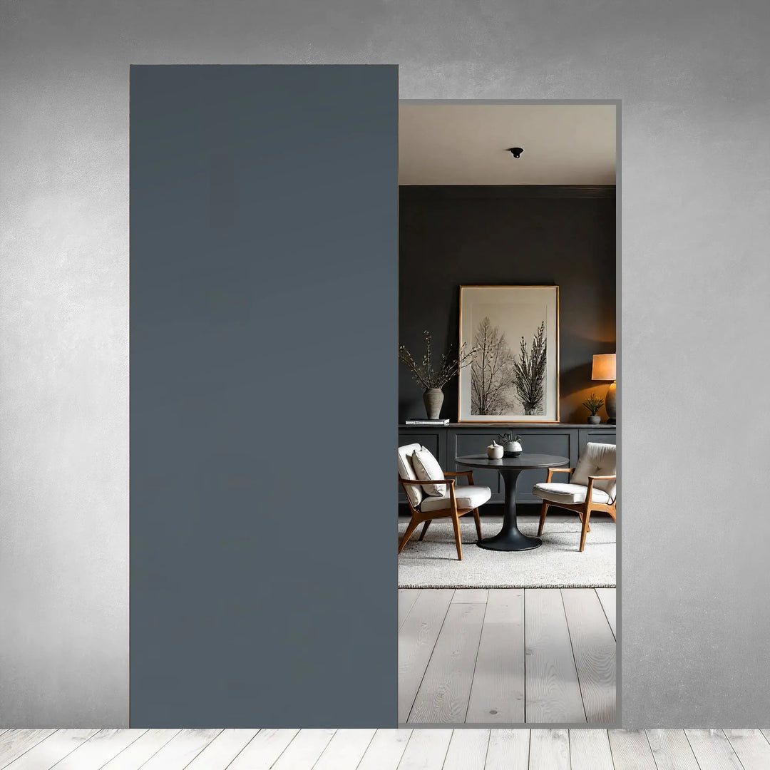 Ghost Sliding Door in Storm Grey melamine with fully concealed sliding system, open position showing interior dining room